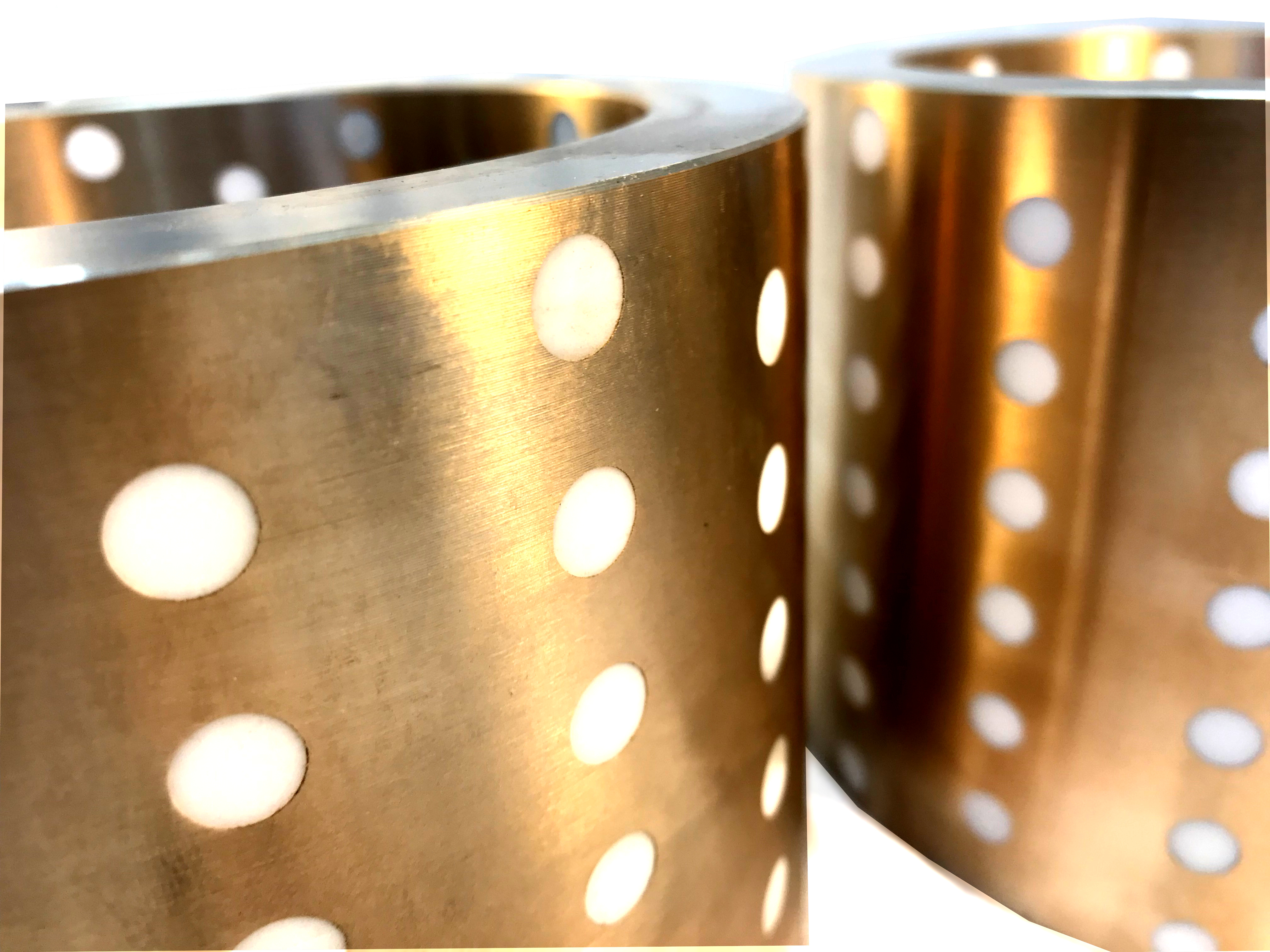 PTFE Plugged Bronze Bushings - National Bronze Manufacturing PTFE Plugged Bronze Bushings - National Bronze Manufacturing